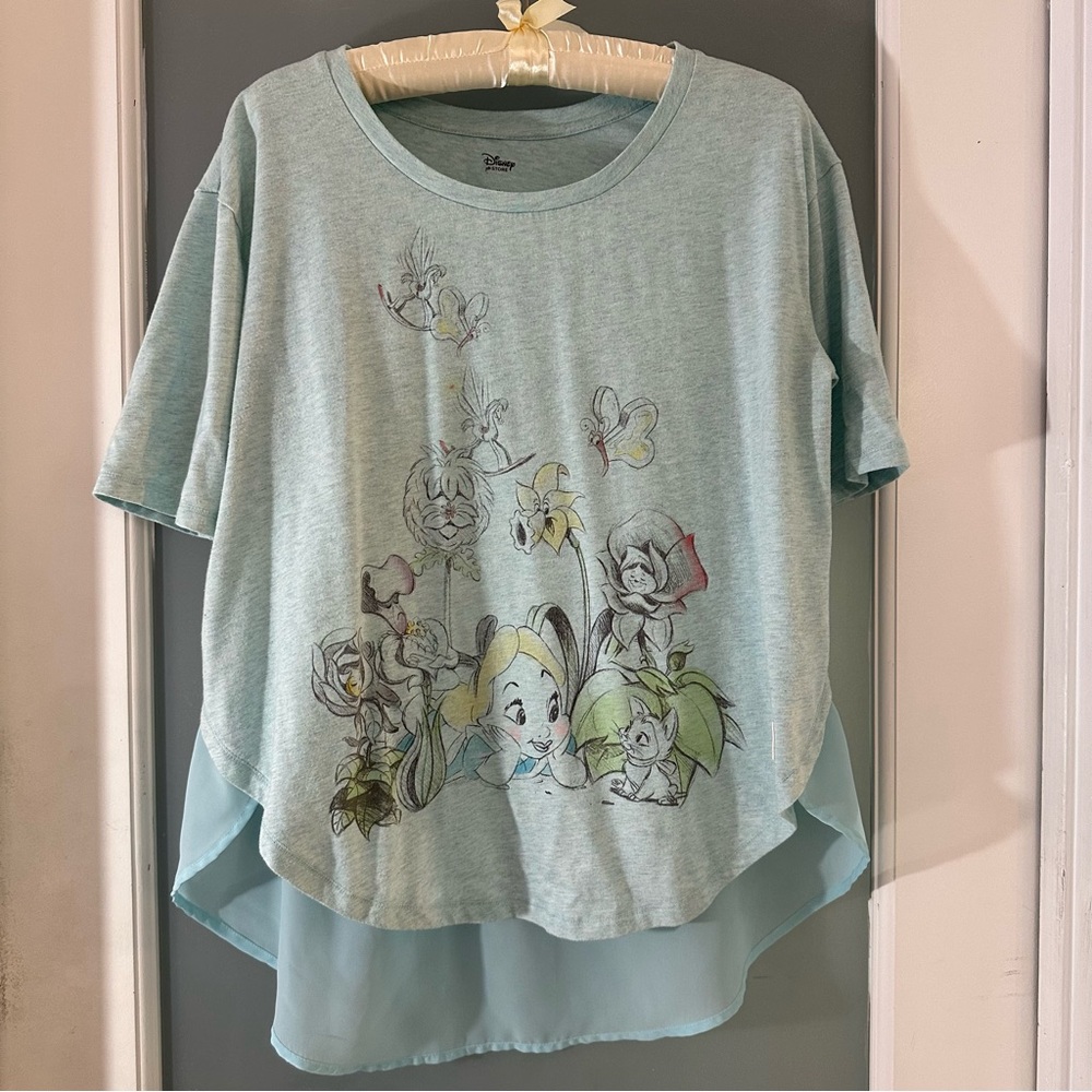 Disney’s Animators “Alice” in Sheer (back panel) light Blue Top